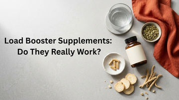  Plain amber supplement bottle beside pumpkin seeds, maca root and a glass of water on a light kitchen counter